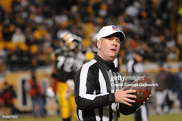 National Football League referee John Parry looks on from the field during a game between the Green Bay Packers and the Pittsburgh Steelers at Heinz...