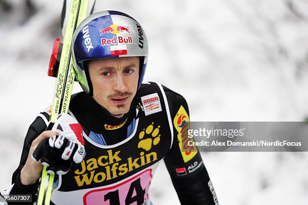 Adam Malysz of Poland looks on during the FIS Ski Jumping World Cup event at the 58th Four Hills Ski Jumping Tournament on January 06, 2010 in...