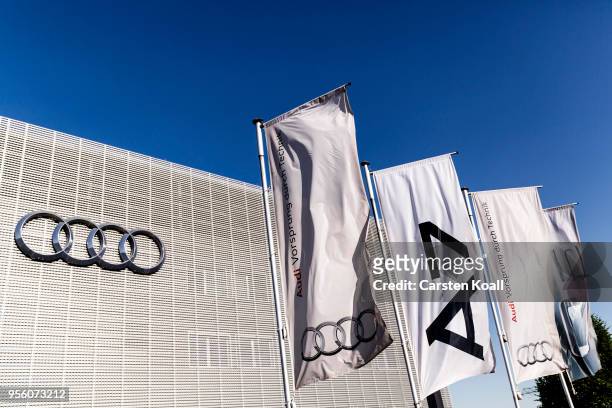 Company flags waving in front of a building at an Audi dealership on May 8, 2018 in Berlin, Germany. According to media reports German authorities...
