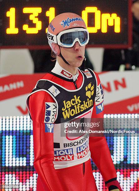 Martin Koch of Austria reacts after the final jump during the FIS Ski Jumping World Cup event at the 58th Four Hills Ski Jumping Tournament on...