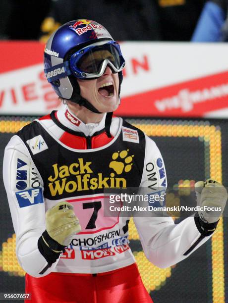 Thomas Morgenstern of Austria celebrates winning the FIS Ski Jumping World Cup event at the 58th Four Hills Ski Jumping Tournament on January 06,...