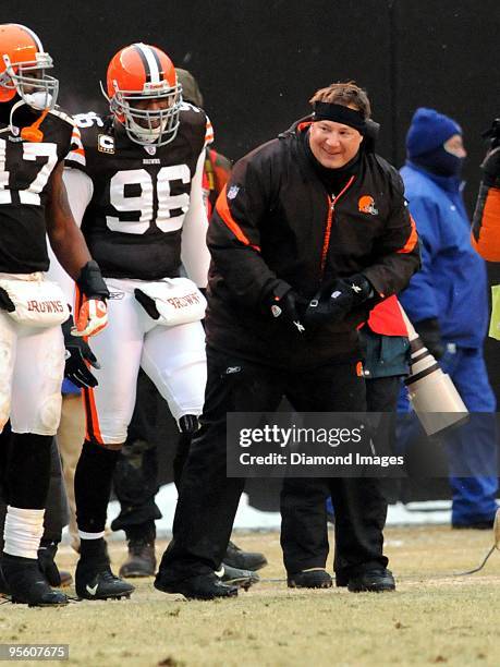 Head coach Eric Mangini of the Cleveland Browns smiles as the final seconds tick away during a game on January 3, 2010 against the Jacksonville...