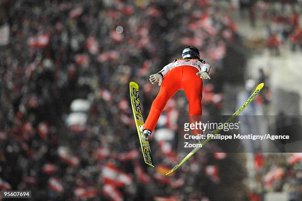 Thomas Morgenstern of Austria takes 1st place during for the FIS Ski Jumping World Cup event at the 58th Four Hills ski jumping tournament on January...