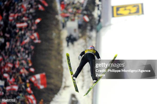 Andreas Kofler of Austria takes 1st place of the tournee during for the FIS Ski Jumping World Cup event at the 58th Four Hills ski jumping tournament...