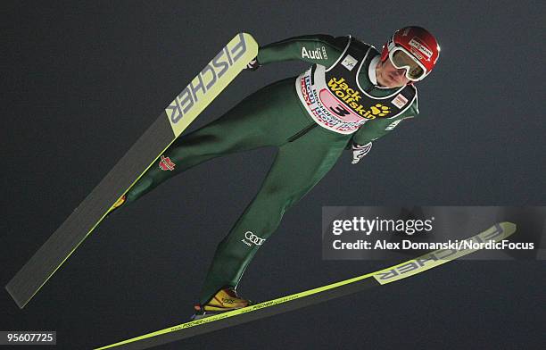 Michael Uhrmann of Germany competes during the FIS Ski Jumping World Cup event at the 58th Four Hills Ski Jumping Tournament on January 06, 2010 in...