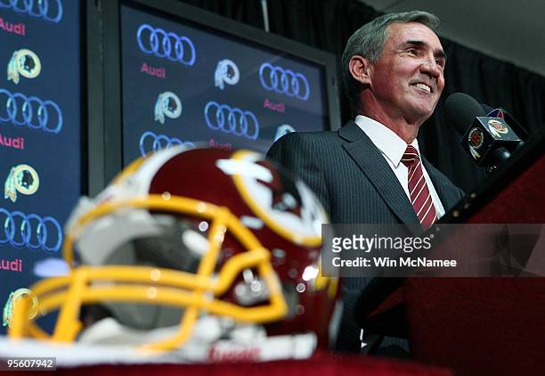 Mike Shanahan answers questions at a press conference where he was introduced as the new head coach of the Washington Redskins on January 6, 2010 in...