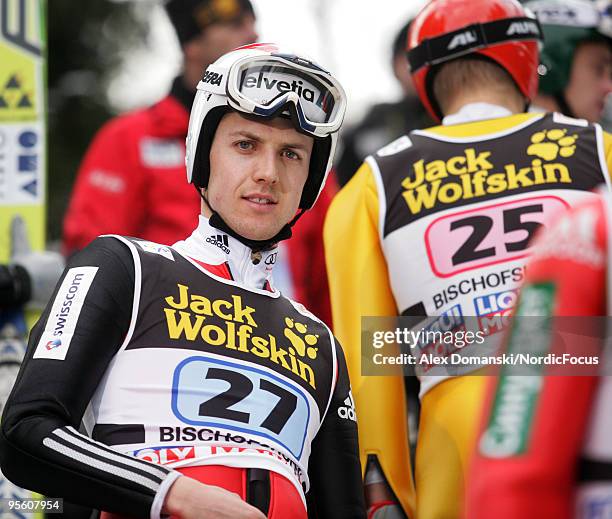 Simon Ammann of Switzerland looks on during the FIS Ski Jumping World Cup event at the 58th Four Hills Ski Jumping Tournament on January 06, 2010 in...