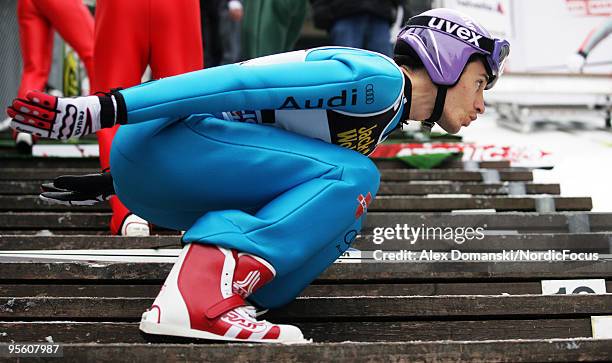 Martin Schmitt of Germany warms up during the FIS Ski Jumping World Cup event at the 58th Four Hills Ski Jumping Tournament on January 06, 2010 in...