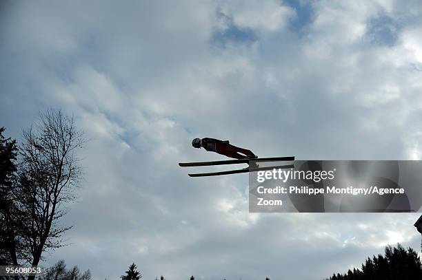 Simon Ammann of Switzerland takes 3rd place during for the FIS Ski Jumping World Cup event at the 58th Four Hills ski jumping tournament on January...