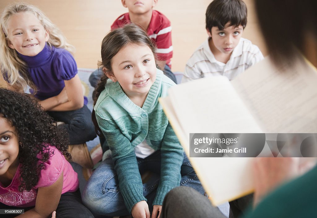 Children listening to their teacher read