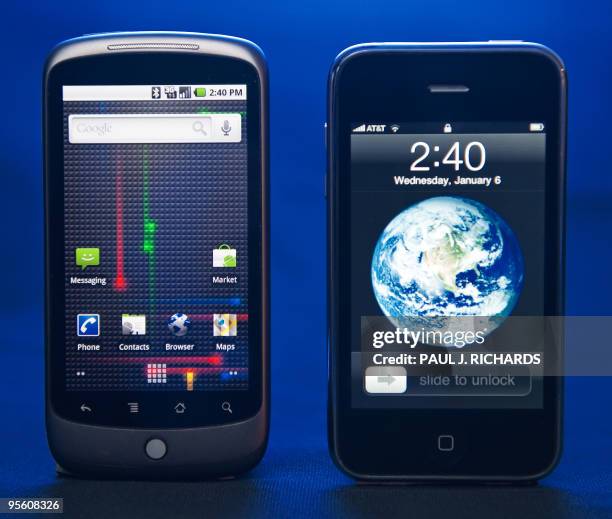 The Google Nexus One smartphone with provider service from T-Mobile and the Apple iPhone , with provider service from AT&T, sit side by side January...