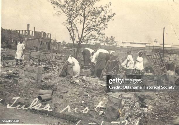 People searching through rubble after the Tulsa Race Massacre, Tulsa, Oklahoma, June 1921.