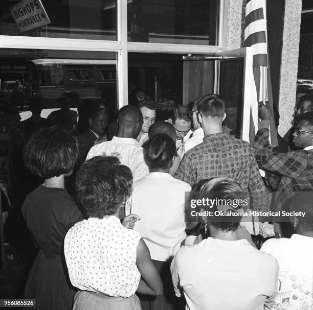 Photograph of an African American Civil Rights segregation protest led by Clara Luper at Bishop's Restaurant at 113 North Broadway, Oklahoma City,...