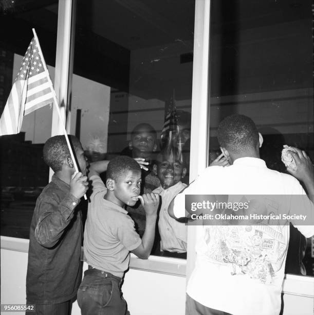 Photograph of Linda Benson and Cecil L Williams during an African American Civil Rights segregation protest at Bishop's Restaurant at 113 North...