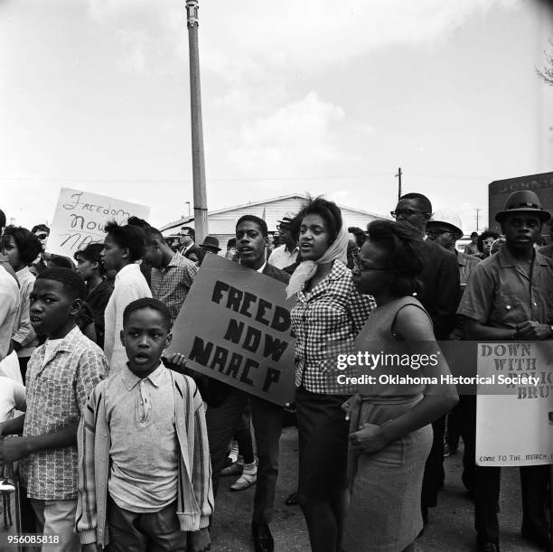 Photograph of a NAACP 'Freedom Now' Civil Rights march at the corner of Couch Drive and North Shartel Avenue, Oklahoma City, Oklahoma, April 3, 1965.