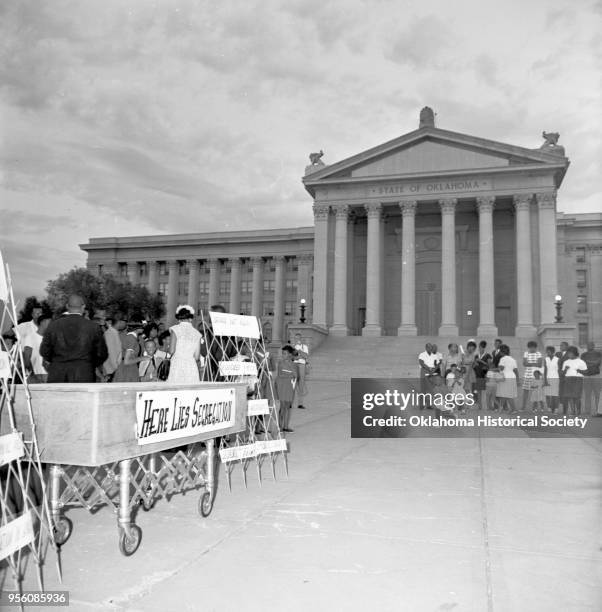 Photograph of a 'Jim Crow funeral' during an African American Civil Rights protest held at the Oklahoma State Capitol, Oklahoma City, Oklahoma,...