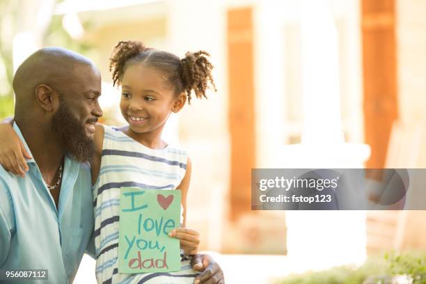 happy father's day. girl gives card to dad. - i love you card stock pictures, royalty-free photos & images