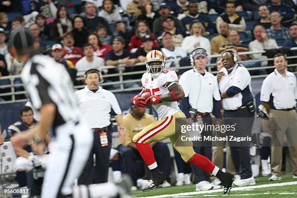 Vernon Davis of the San Francisco 49ers runs the ball for a touchdown tying the NFL record for tight ends during the NFL game against the St. Louis...