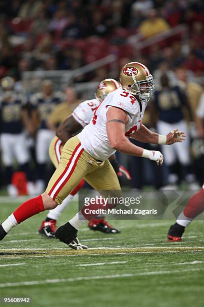 Justin Smith of the San Francisco 49ers rushes during the NFL game against the St. Louis Rams at Edward Jones Dome on January 3, 2010 in St. Louis,...