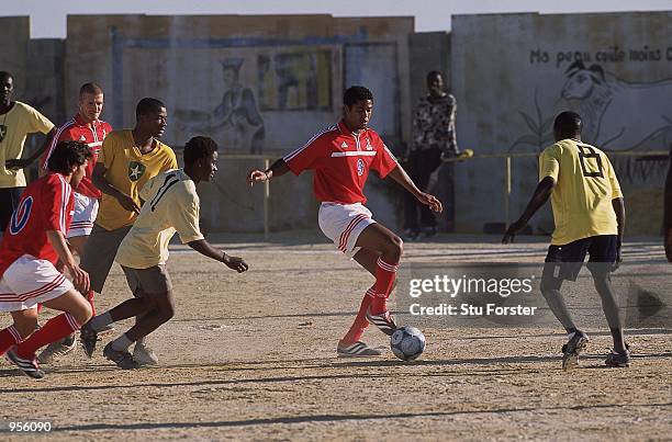 Patrick Kluivert of Barcelona and Holland takes part in the Adidas I Kiss Football Commercial campaign held in Mofolo, South Africa. \ Mandatory...