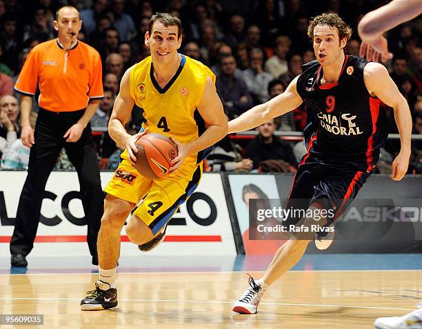 Igkor Milosevits, #4 of Maroussi BC competes with Marcelinho Huertas, #9 of Caja Laboral during the Euroleague Basketball Regular Season 2009-2010...