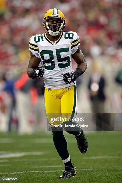 Greg Jennings of the Green Bay Packers runs on the field against the Arizona Cardinals at University of Phoenix Stadium on January 3, 2010 in...