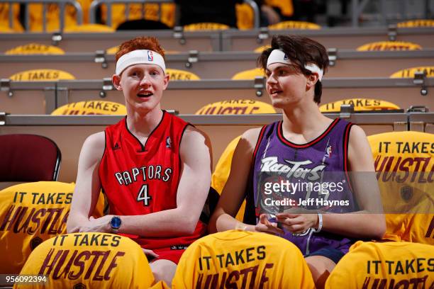 Toronto Raptors fans look on before Game Four of the Eastern Conference Semifinals of the 2018 NBA Playoffs on May 7, 2018 at Quicken Loans Arena in...