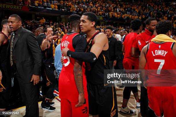 Jordan Clarkson of the Cleveland Cavaliers hugs Delon Wright of the Toronto Raptors after Game Four of the Eastern Conference Semifinals of the 2018...