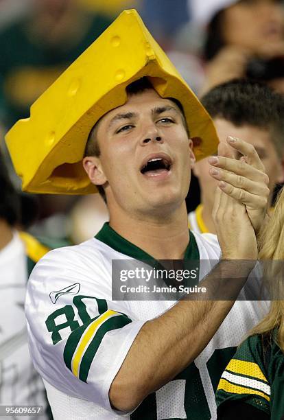 Green Bay Packers fan cheers on the team against the Arizona Cardinals at University of Phoenix Stadium on January 3, 2010 in Glendale, Arizona.