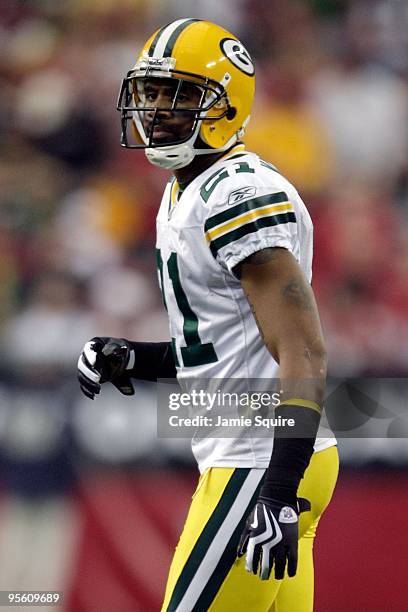 Charles Woodson of the Green Bay Packers looks on from the field against the Arizona Cardinals in the second quarter at University of Phoenix Stadium...