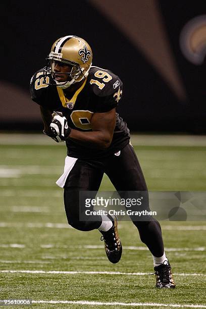 Devery Henderson of the New Orleans Saints takes off during the game against the Tampa Bay Buccaneers at the Louisiana Superdome on December 27, 2009...