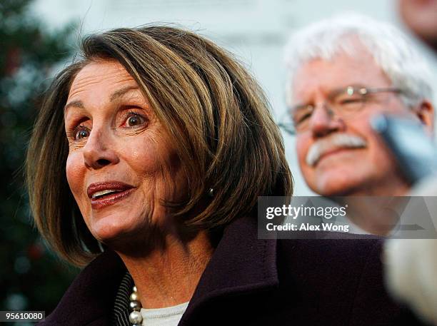 Speaker of the House Rep. Nancy Pelosi speaks to the media as Rep. George Miller listens after a meeting with President Barack Obama at the White...