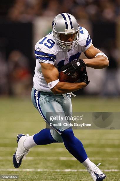 Miles Austin of the Dallas Cowboys runs with the ball against the New Orleans Saints at the Louisiana Superdome on December 19, 2009 in New Orleans,...