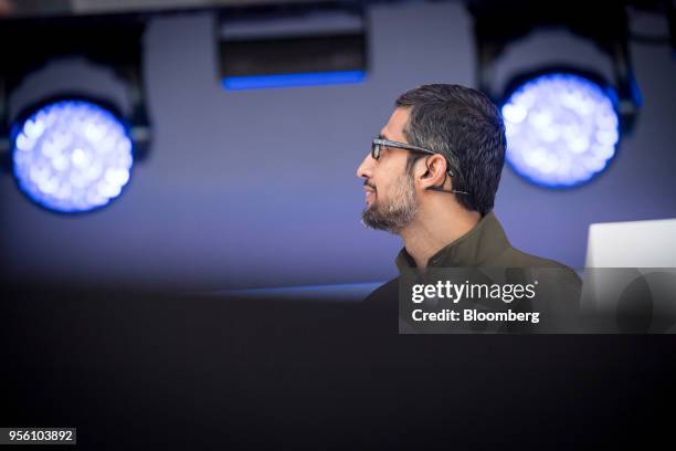 Sundar Pichai, chief executive officer of Google Inc., watches a presentation during the Google I/O Developers Conference in Mountain View,...