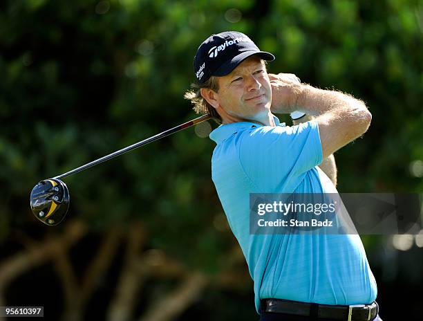 Retief Goosen hits from the first tee box during practice for the SBS Championship at Plantation Course at Kapalua on January 6, 2010 in Kapalua,...