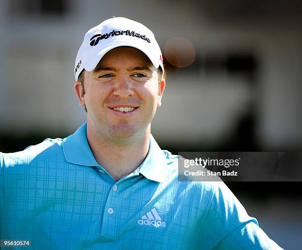 Martin Laird smiles from the first tee box during practice for the SBS Championship at Plantation Course at Kapalua on January 6, 2010 in Kapalua,...