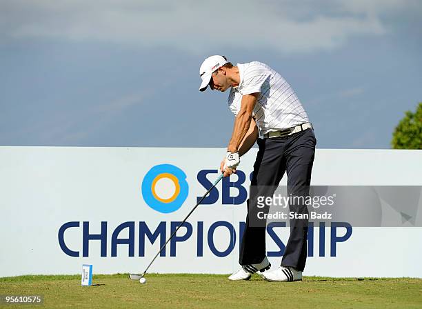 Dustin Johnson hits from the 10th tee box during practice for the SBS Championship at Plantation Course at Kapalua on January 6, 2010 in Kapalua,...