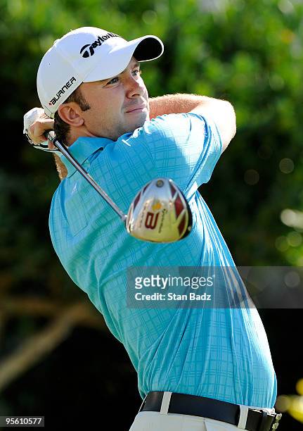 Martin Laird hits a drive from the first tee box during practice for the SBS Championship at Plantation Course at Kapalua on January 6, 2010 in...