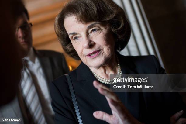 Sen. Dianne Feinstein, D-Calif., talks with a reporter before the Senate Democratic Policy luncheon in the Capitol on May 8, 2018.