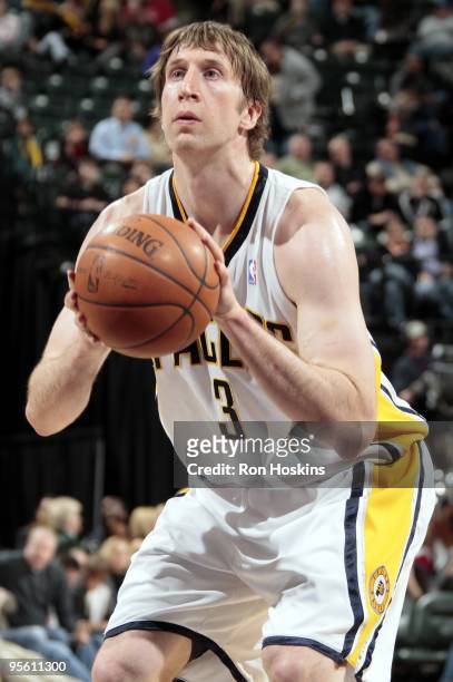 Troy Murphy of the Indiana Pacers shoots a free throw during the game against the Milwaukee Bucks at Conseco Fieldhouse on December 21, 2009 in...