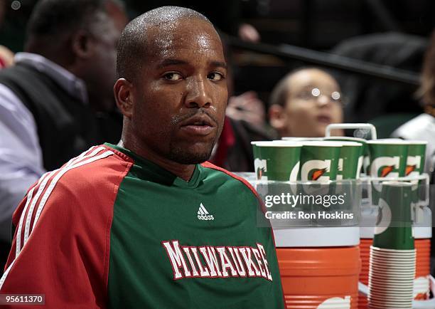 Michael Redd of the Milwaukee Bucks looks on from the bench during the game against the Indiana Pacers at Conseco Fieldhouse on December 21, 2009 in...