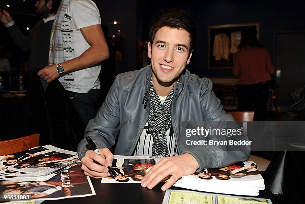 Actor Logan Henderson greets fans at Nickelodeon's BIG TIME RUSH screening at Planet Hollywood Times Square on January 6, 2010 in New York City. BIG...