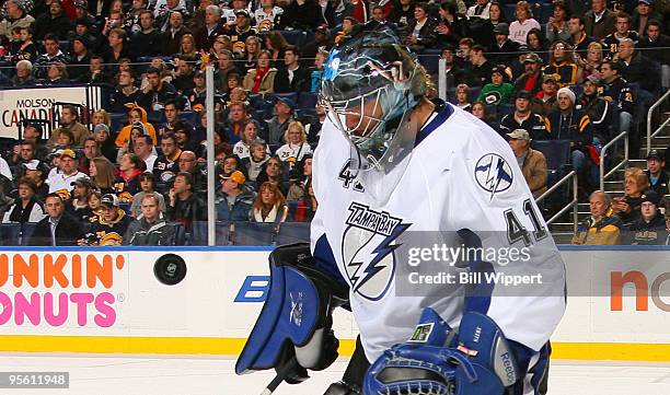 Mike Smith of the Tampa Bay Lightning keeps his eye on the flying puck in a game against the Buffalo Sabres on January 6, 2010 at HSBC Arena in...