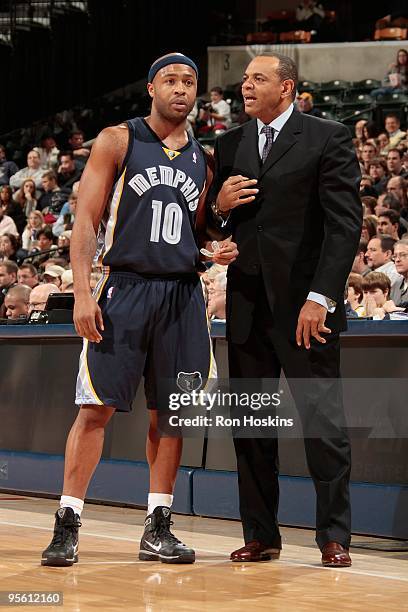 Jamaal Tinsley and head coach Lionel Hollins of the Memphis Grizzlies talk during the game against the Indiana Pacers on December 30, 2009 at Conseco...