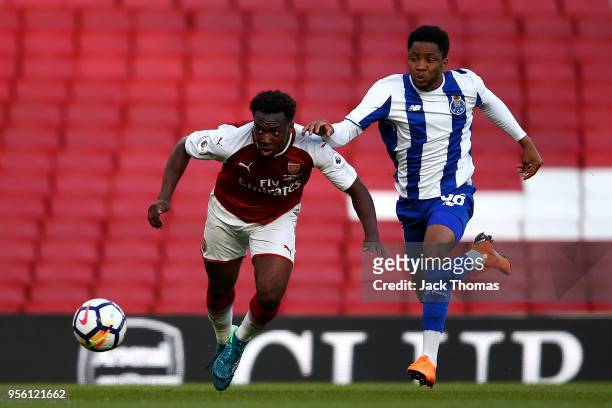 Tolaji Bola of Arsenal U/23 and Musa Yahaya of Port U23 in action during the Premier League International Trophy between Arsenal U23 and Porto U23 at...