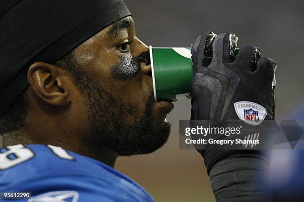 Calvin Johnson of the Detroit Lions drinks from a Gatorade cup during the game against the Arizona Cardinals on December 20, 2009 at Ford Field in...