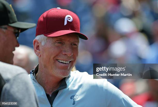 Former Philadelphia Phillies third baseman and member of the baseball Hall of Fame, Mike Schmidt engages in conversation on the field before a game...