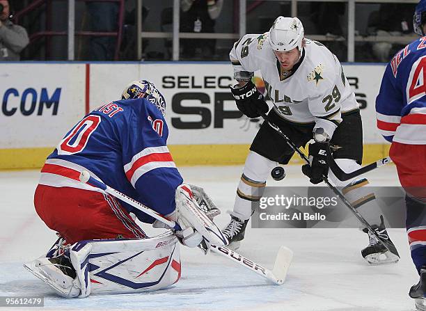 Henrik Lundqvist of the New York Rangers makes a save off of a shot by Steve Ott of the Dallas Stars during their game on January 6, 2010 at Madison...