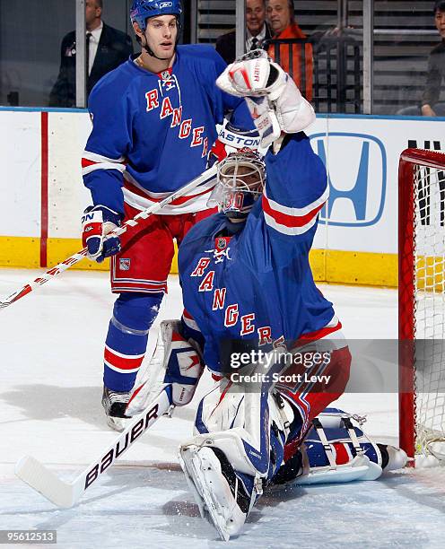 Henrik Lundqvist of the New York Rangers makes a glove save against the Dallas Stars on January 6, 2010 at Madison Square Garden in New York City.