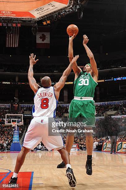 Rasheed Wallace of the Boston Celtics takes a jump shot against Brian Skinner of the Los Angeles Clippers during the game at Staples Center on...